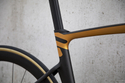 Road bicycle RIDLEY NOAH FAST DISC - Ultegra Di2 2x12s - color NFD-03Am (Black Metallic-Honey Gold Metallic)