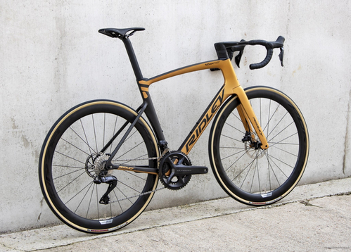 Road bicycle RIDLEY NOAH FAST DISC - 105 Di2 2x12s - color NFD-03Am (Black Metallic-Honey Gold Metallic)