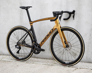 Road bicycle RIDLEY NOAH FAST DISC - 105 Di2 2x12s - color NFD-03Am (Black Metallic-Honey Gold Metallic)